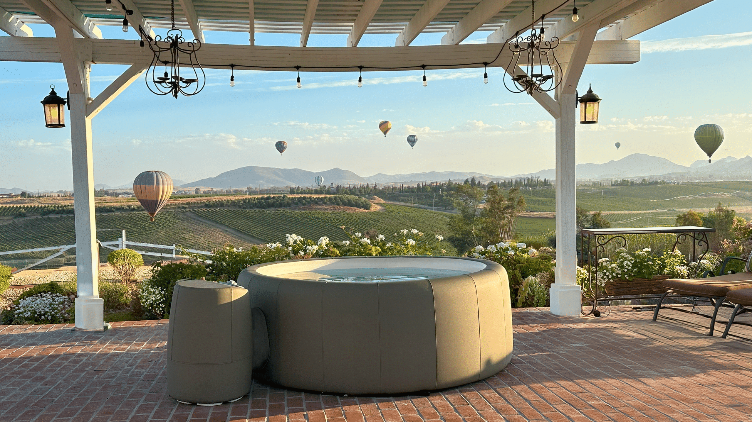 Softub Legend 220 portable small hot tub with open sofa-style seating